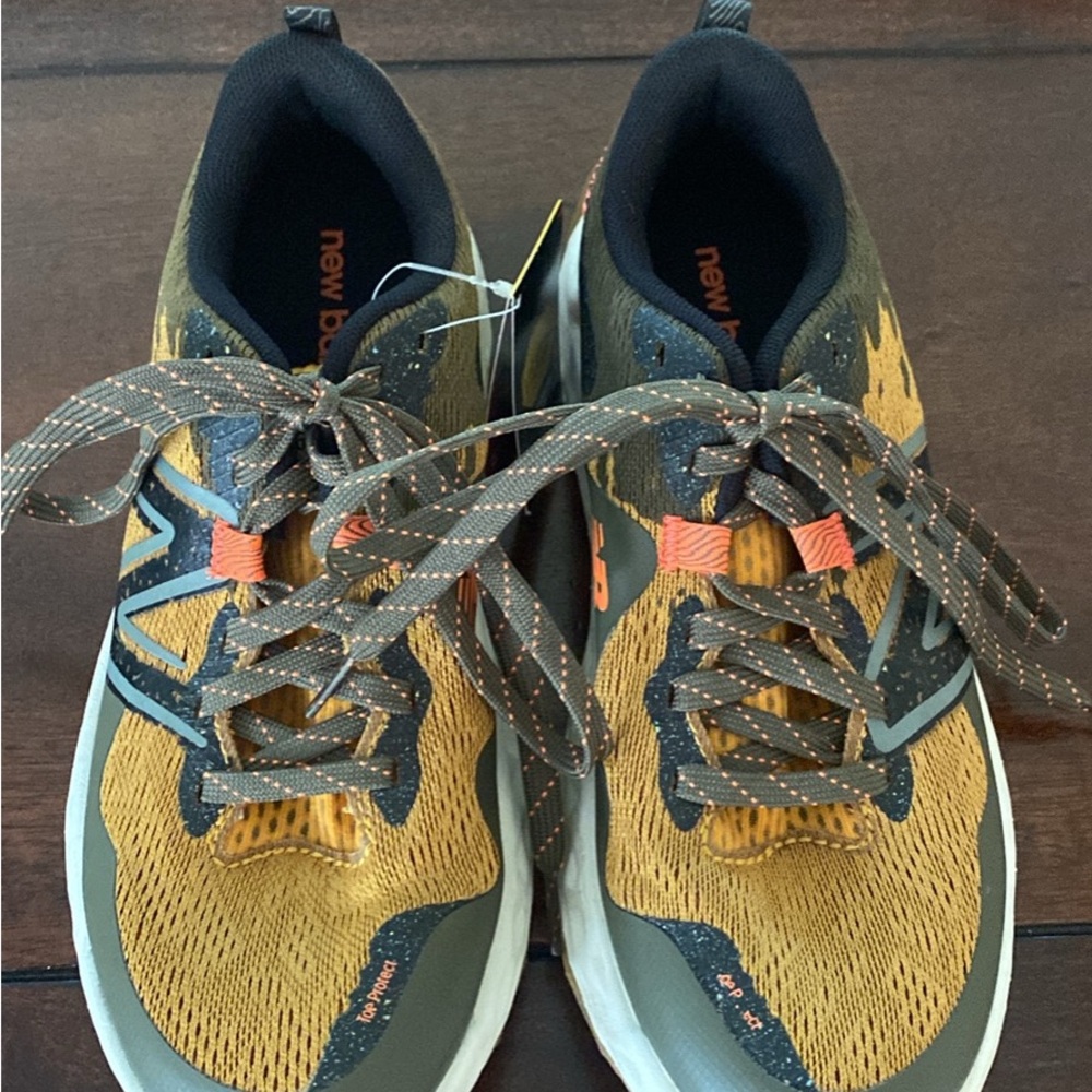 New Balance Kid Athletic Shoes - Gold and Gray. Big boy size 5, worn once